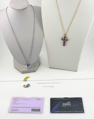 Lot 422 - Three gem pendant necklaces