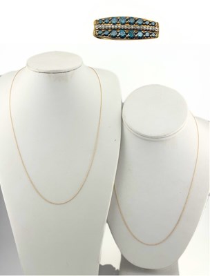 Lot 440 - A 9ct gold treated blue and colourless diamond pendant and two fine chain necklaces