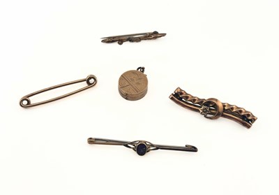 Lot 391 - Four early 20th century brooches and a rolled gold locket pendant