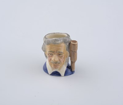 Lot 762 - Royal Doulton, a tiny protoype character jug,...
