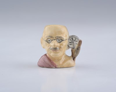 Lot 760 - Royal Doulton, a tiny protoype character jug,...