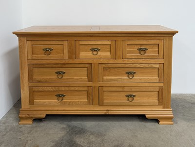 Lot 791 - A Frank Hudson light oak chest of drawers, a...