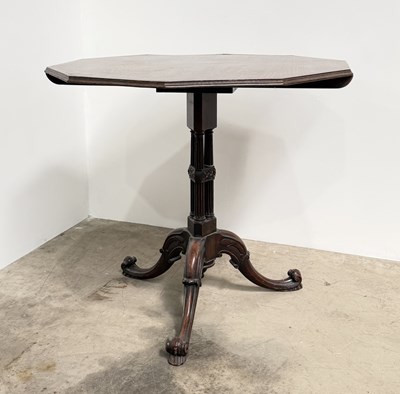 Lot 768 - A 19th century mahogany decagonal flip top...