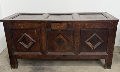 Lot 824 - An 18th century three panel oak coffer, with...