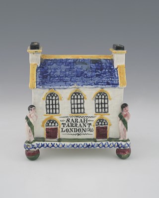 Lot 782 - A Mexborough Prattware Pottery money box,...