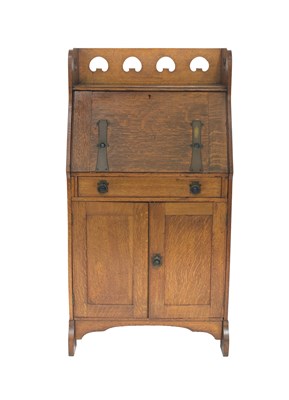 Lot 613 - An Arts and Crafts oak and Ruskin cabochon set...