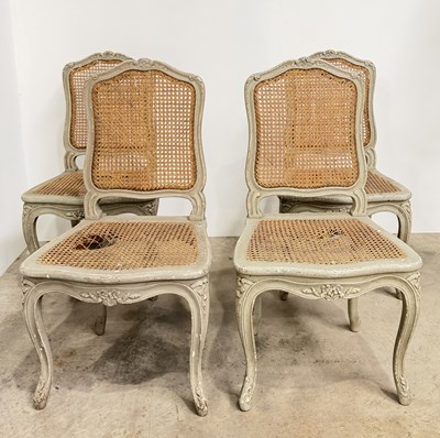 Lot 840 - A set of four Louis XV style caned dining...