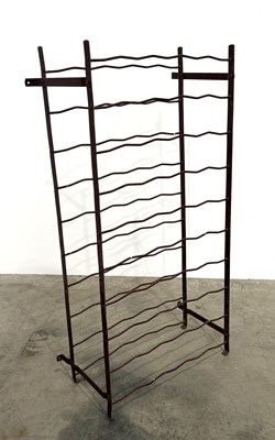 Lot 851 - A vintage French style wine rack, maroon...