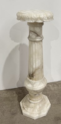 Lot 760 - A carved alabaster pedestal stand, detachable...