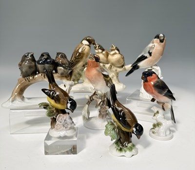 Lot 115 - A collection of hand painted gloss continental...