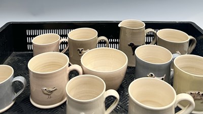 Lot 41 - A selection of Jane Hogben earthenware mugs...