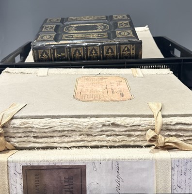 Lot 92 - Three large, decorative hand laid paper albums,...