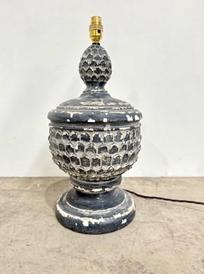 Lot 196 - A bulbous wooden lamp, artichoke form with...