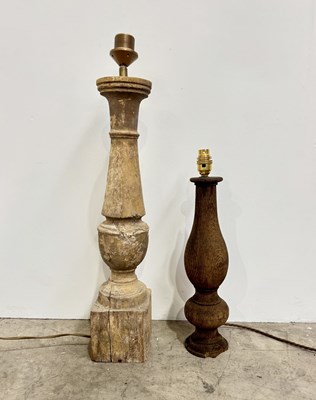 Lot 180 - Two late 20th century turned wooden baluster...