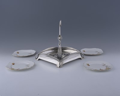Lot 95 - An Arts and Crafts silver-plated grape stand,...
