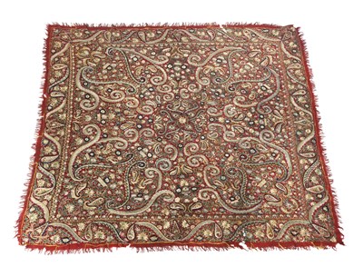 Lot 650 - A large crimson paisley square shawl, possibly...