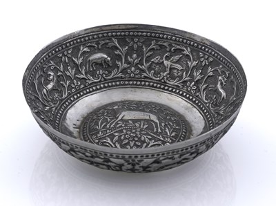 Lot 47 - An Eastern silver-coloured metal dish or...