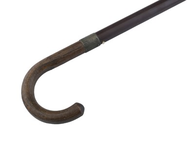 Lot 624 - A 1930s Bekko type torch stick, simulated...