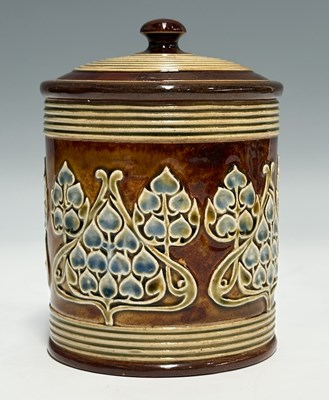 Lot 122 - Royal Doulton, a stoneware tobacco jar and...