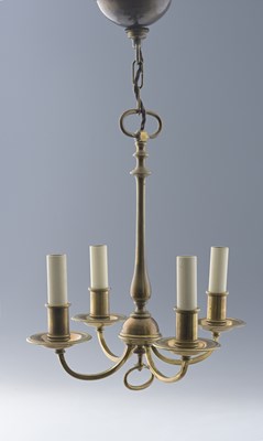 Lot 109 - An Edwardian Arts and Crafts style brass four...