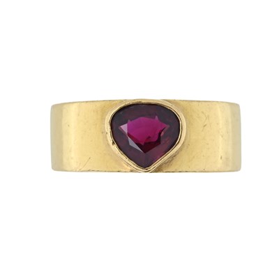 Lot 145 - A 22ct gold fancy-cut ruby collet single stone band ring