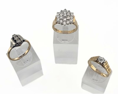 Lot 403 - Three diamond and cubic zirconia rings