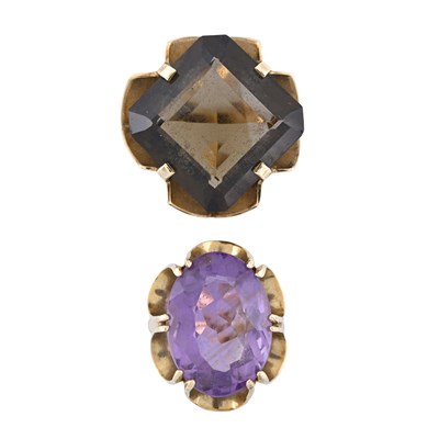 Lot 419 - Two 9ct gold smoky quartz and amethyst single stone rings