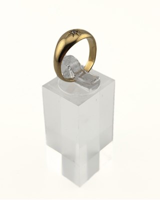 Lot 444 - An Edwardian 18ct gold old-cut diamond band ring