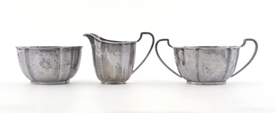 Lot 212 - A set of three George VI silver tea wares, by...