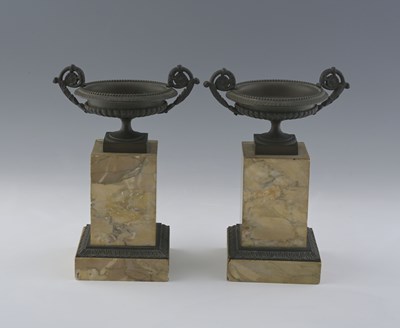 Lot 653 - A pair of 'Grand Tour' bronze twin-handled...