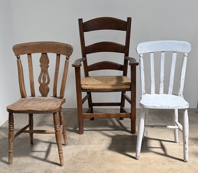 Lot 816 - Three farm house chairs of varying ages, to...