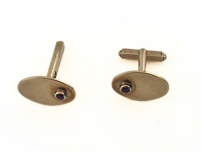 Lot 438 - A pair of 9ct gold ruby oval cufflinks