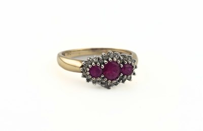Lot 409 - A 9ct gold ruby and single-cut diamond cluster ring