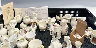 Lot 46 - A collection of Goss, crested china ornaments...
