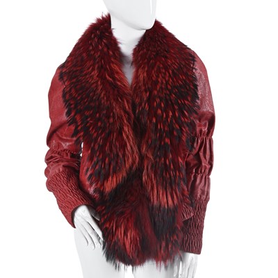 Lot 599 - King Truva, a red leather jacket w/ dyed coyote collar.