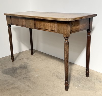 Lot 857 - An early 19th century mahogany buffet with two...
