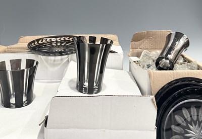 Lot 52 - A collection of OKA glasses, striped in black...