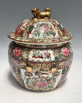 Lot 148 - A famille rose ginger jar and lid with gold...