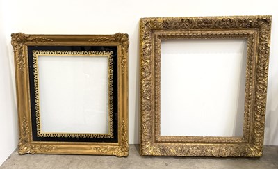 Lot 742 - Two 19th century gold coloured ornate swept...
