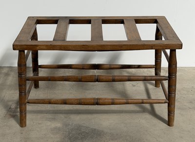 Lot 781 - An early 20th century turned beech luggage...