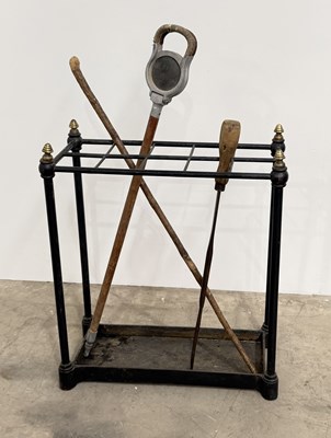 Lot 807 - An early 20th century cast iron stick stand...