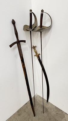 Lot 266 - A Tulwar type sword with cast brass embossed...