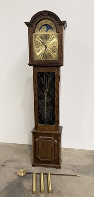 Lot 847 - A late 20th century oak long case clock by...