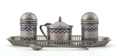 Lot 304 - A George V silver condiment set on stand, by...