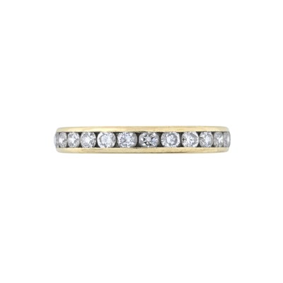 Lot 59 - Tiffany & Co., an 18ct gold brilliant-cut diamond full eternity ring