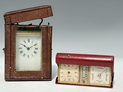 Lot 274 - A brass carriage clock with bevelled glass...
