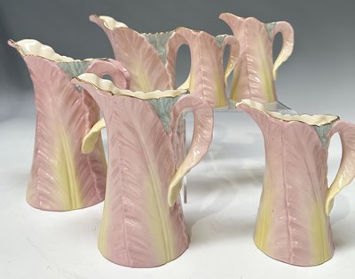 Lot 135 - A set of Royal Worcester 'Blush'graduated jugs,...