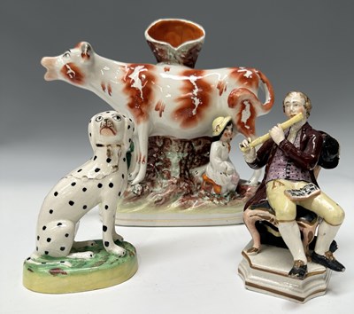 Lot 114 - An early 19th century pearlware figure of a...