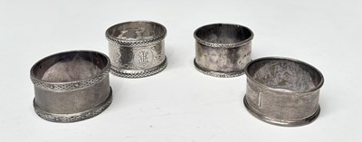 Lot 339 - Four Victorian and later silver napkin rings,...