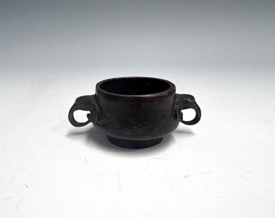 Lot 255 - A diminutive Chinese bronze incense burner...